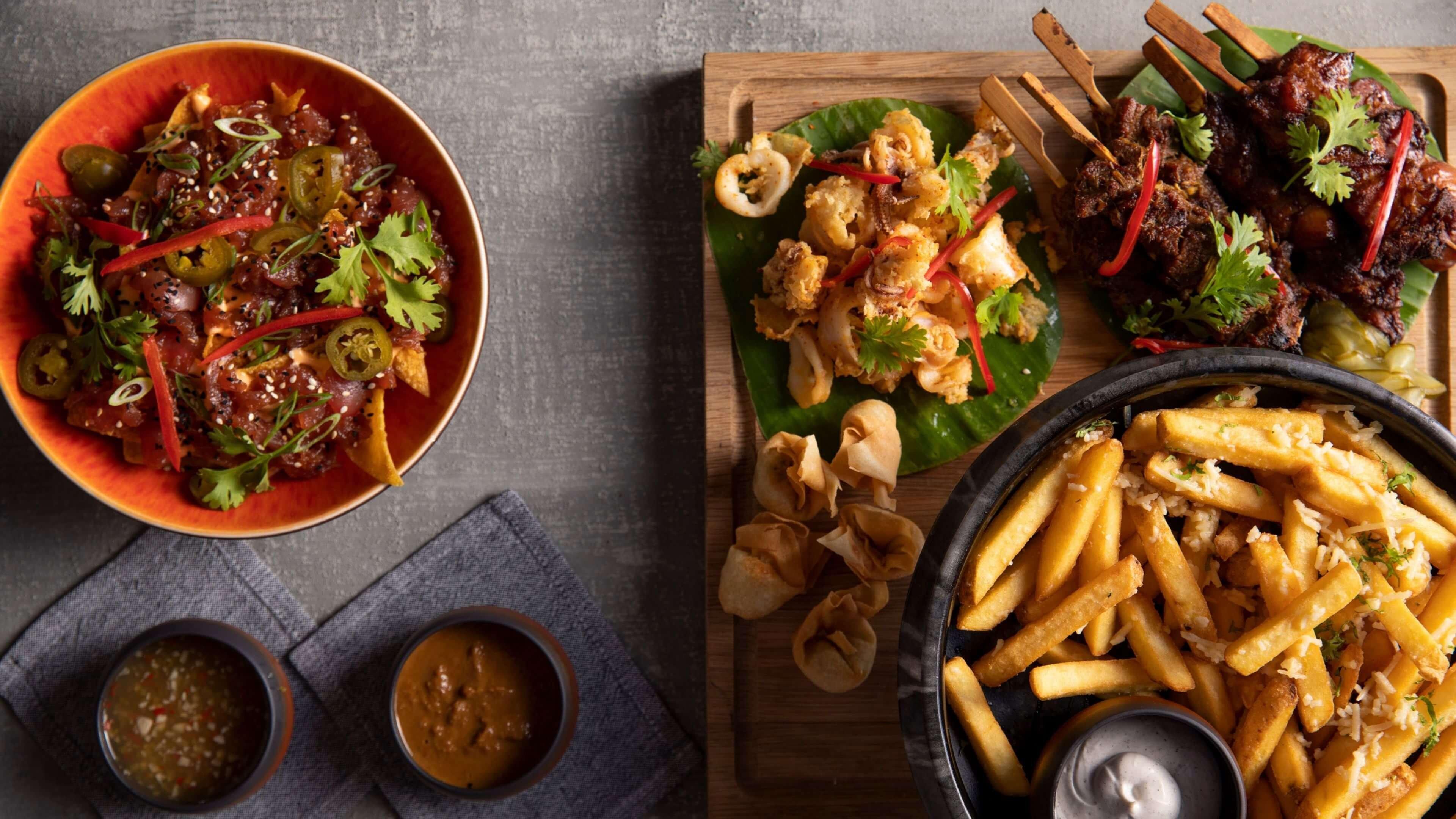 Hotel Indigo Dubai Downtown By Ihg Exteriör bild A selection of dishes from the menu
